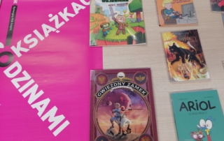 Plakat DKK + ksiązki z wystawy